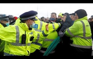 Furious truckers trying to reach France clash with police over Covid-19 testing chaos