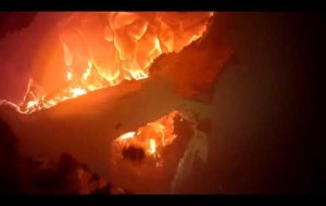 Firefighter helmet cam: shed fire with extension into mobile home